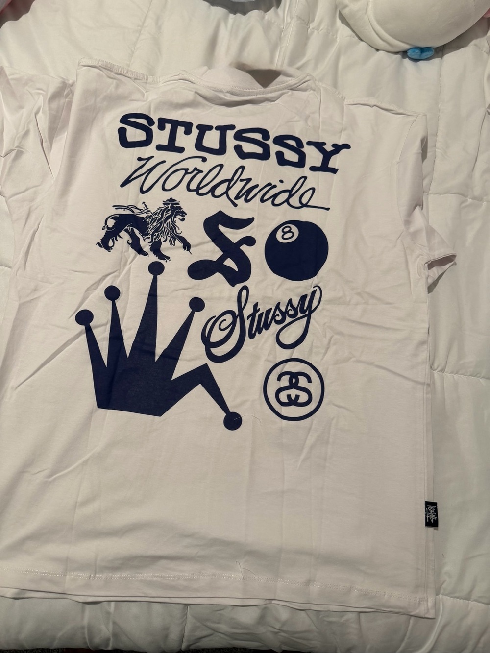 Stussy White Tee with Navy Graphic Logos